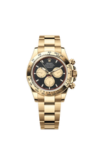 B – Rolex Cosmograph Daytona Yellow Gold Paul Newman Dial